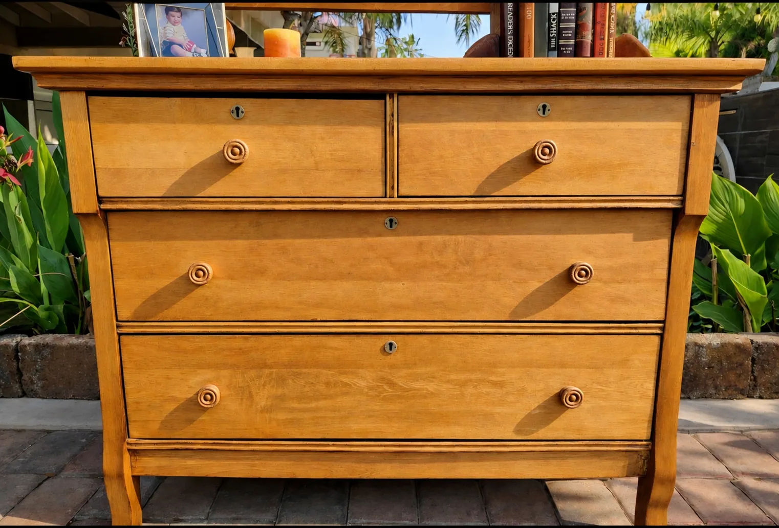 Restored birdseye maple dresser with original round pulls